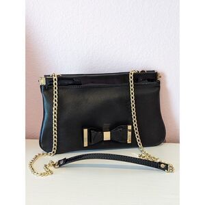 Lulu by Guinness, elegant black shoulder bag or clutch.